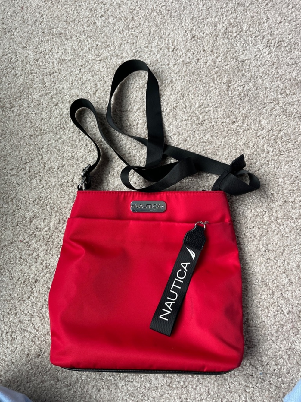 Nautica Red Crossbody with Black Strap and Branded Tag